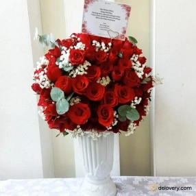 Red Roses in Vase